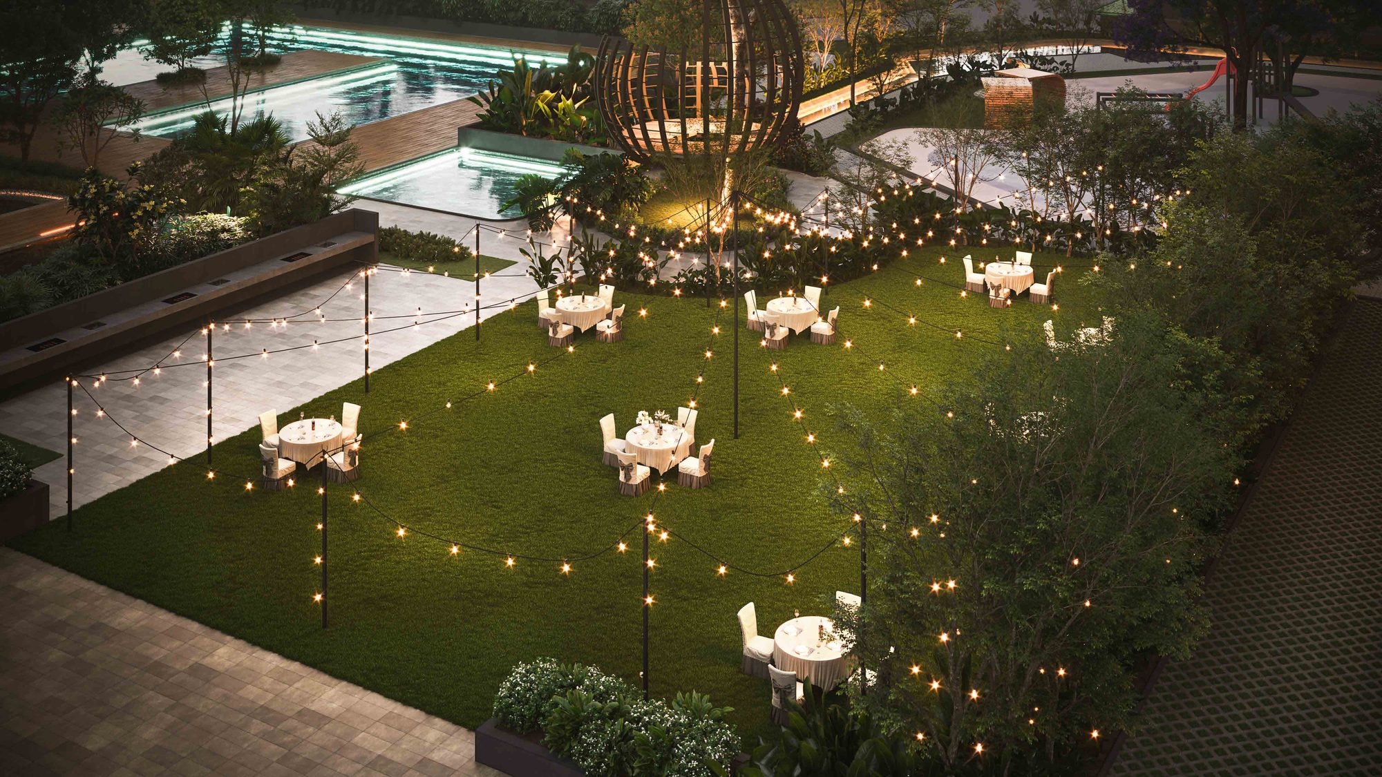 Festive lawn with lights and tables