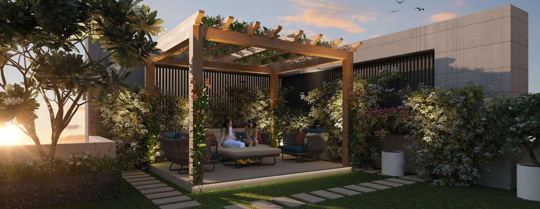 Wooden pergola and day bed on the rooftop at sunset
